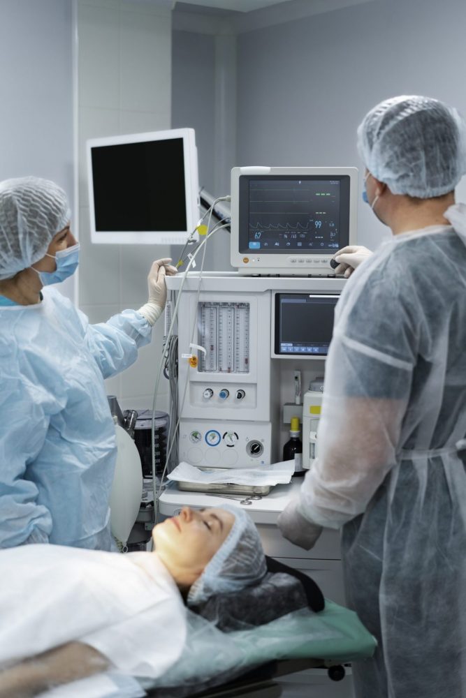 doctors-monitoring-patient-s-pulse